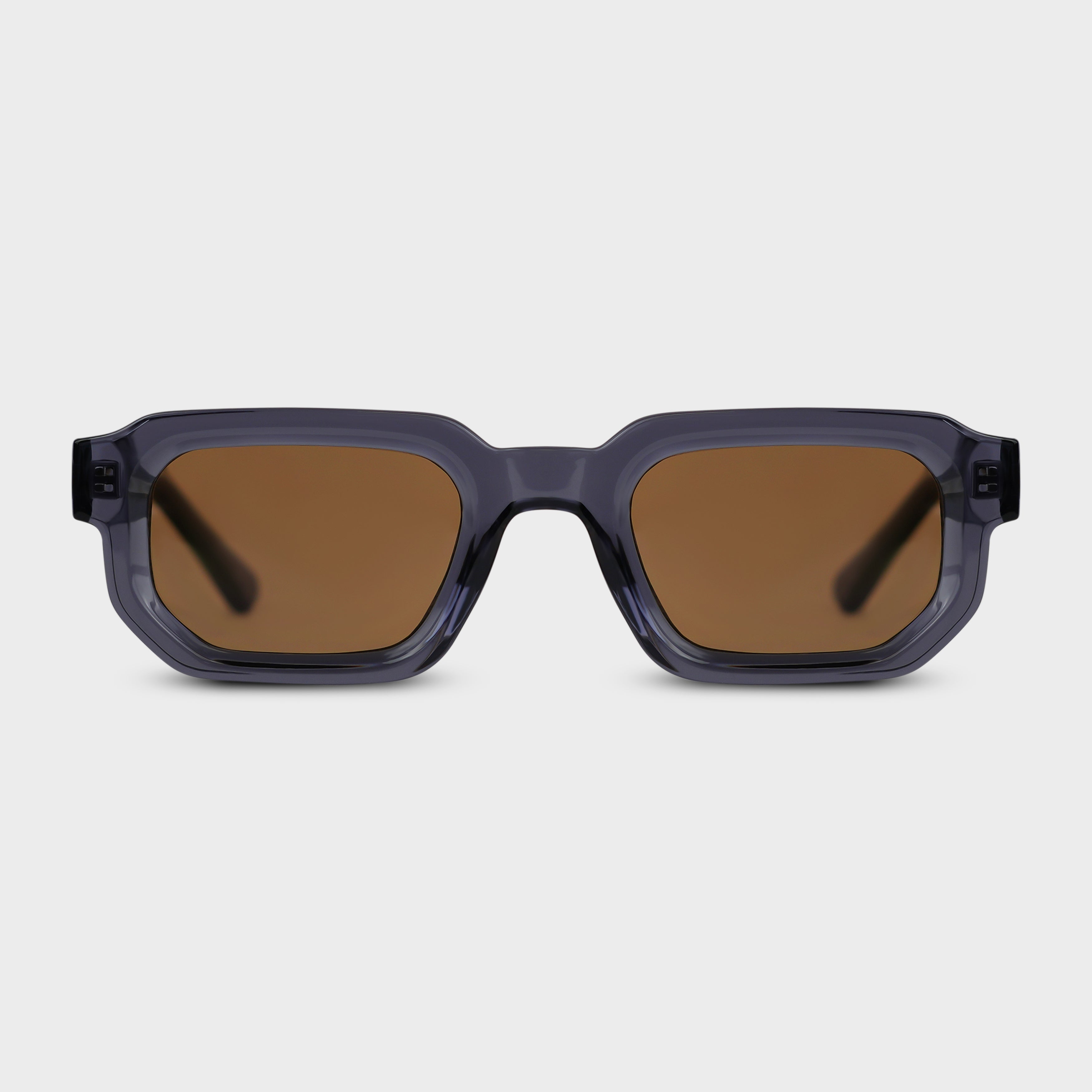 Solbriller i gråblå transparent stel med brune glas set forfra