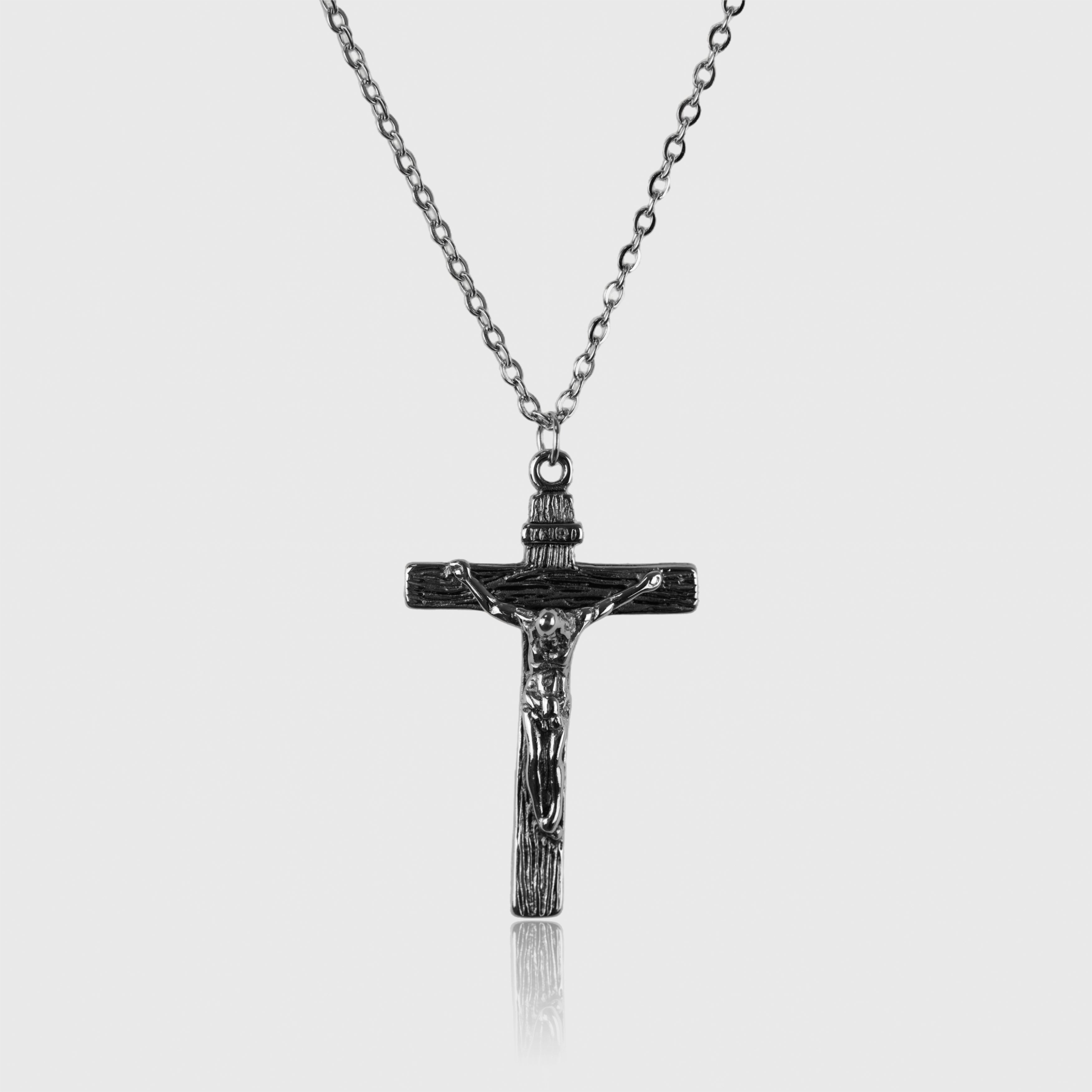 Sølvfarvet kors halskæde med Jesus-figur på kæde