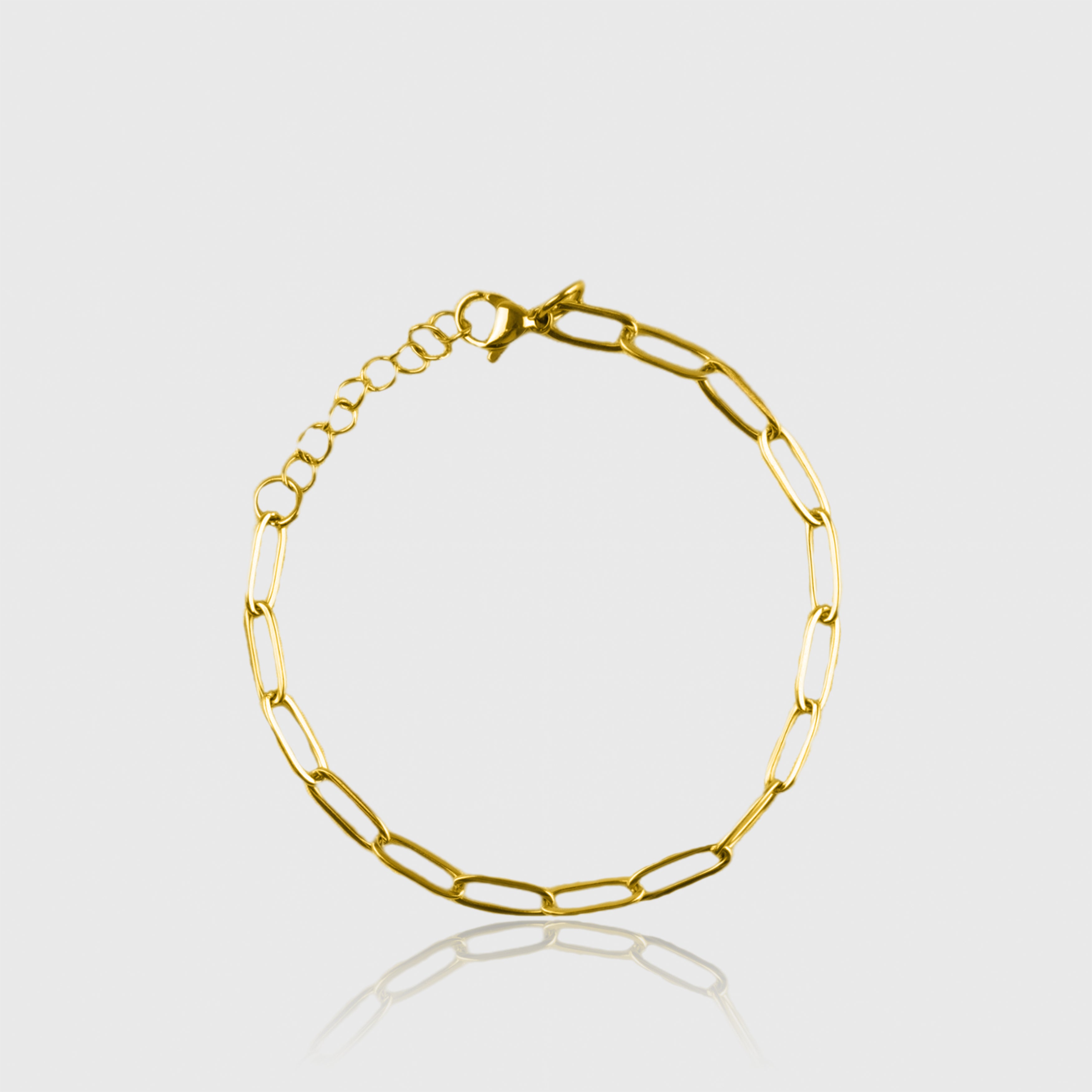 Guldbelagt armbånd med ovale led og karbinlås