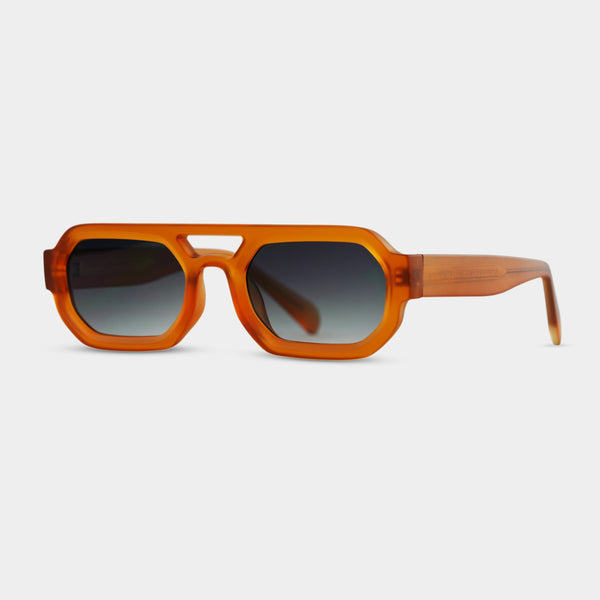 Julius Peach solbriller i orange med gradient-glas fra Fadeless