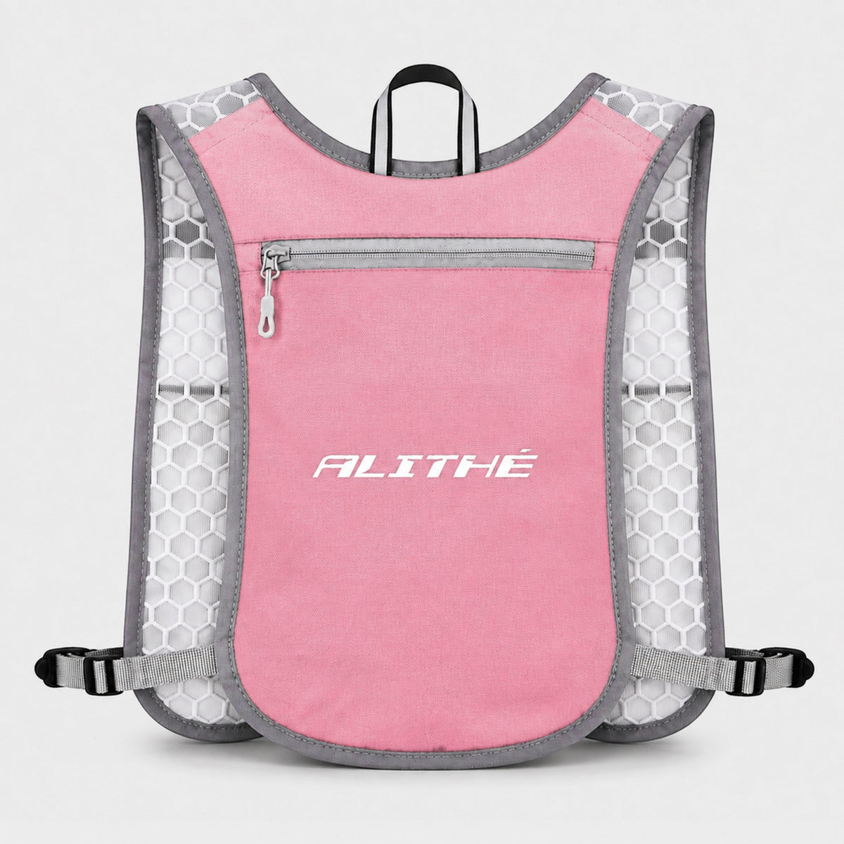 Atlithé performance løbevest i pink med reflekterende detaljer