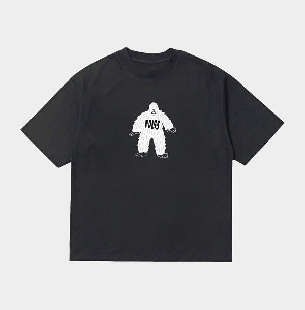 Sort oversized t-shirt med hvidt pelskladet figur og 